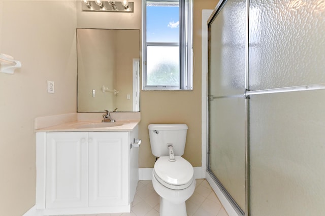 2256 Ridgewood Ct, Royal Palm Beach, FL 33411 - bathroom featuring a shower with shower door, vanity, and tile patterned floors
