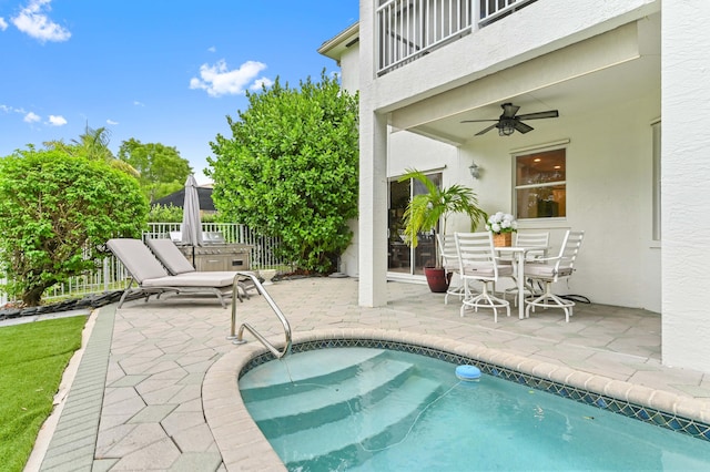 2256 Ridgewood Ct, Royal Palm Beach, FL 33411 - outdoor pool featuring a patio area and ceiling fan
