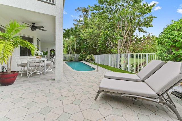 2256 Ridgewood Ct, Royal Palm Beach, FL 33411 - view of swimming pool featuring a patio, ceiling fan, and a fenced backyard