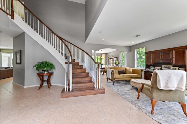 2256 Ridgewood Ct, Royal Palm Beach, FL 33411 - living room with stairway, light tile patterned floors, and recessed lighting