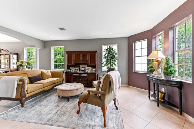 2256 Ridgewood Ct, Royal Palm Beach, FL 33411 - living room with light tile patterned floors, arched walkways, and recessed lighting