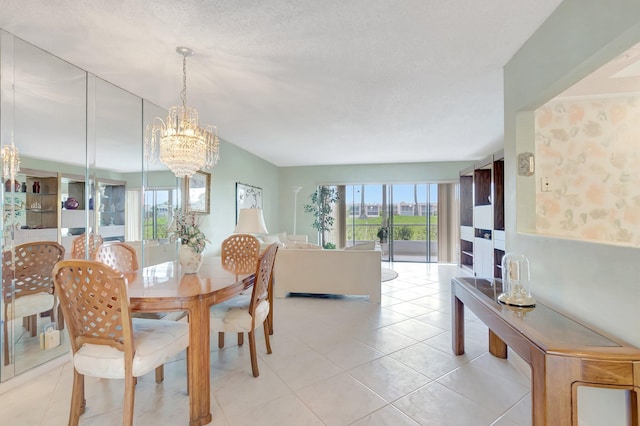 544 Piedmont L, Delray Beach, FL 33484 - dining space featuring light tile patterned floors and a notable chandelier