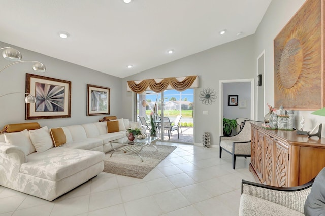 living area with recessed lighting, baseboards, lofted ceiling, and light tile patterned flooring