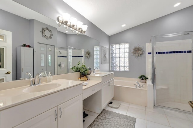 bathroom featuring a bath, a shower stall, a sink, and lofted ceiling