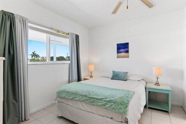 1118 Lake Ter Unit H209, Boynton Beach, FL 33426 - bathroom with vanity and tile patterned floors