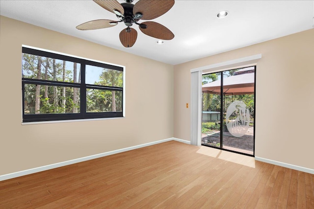 12610 63rd Ln N, The Acreage, FL 33412 - unfurnished room with a ceiling fan, baseboards, recessed lighting, and light wood-style floors