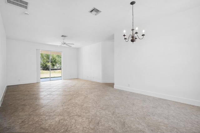 565 SW Feldman Ave N, Port Saint Lucie, FL 34953 - empty room featuring baseboards, visible vents, and ceiling fan with notable chandelier