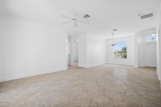 565 SW Feldman Ave N, Port Saint Lucie, FL 34953 - spare room with baseboards, visible vents, and ceiling fan with notable chandelier