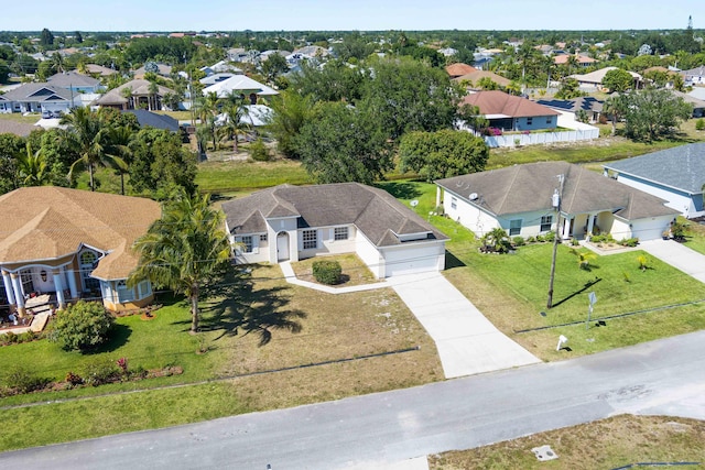 565 SW Feldman Ave N, Port Saint Lucie, FL 34953 - drone / aerial view with a residential view