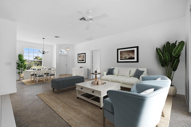 565 SW Feldman Ave N, Port Saint Lucie, FL 34953 - living room with baseboards, ceiling fan with notable chandelier, tile patterned floors, and visible vents