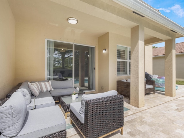 view of patio with an outdoor living space