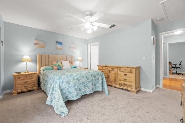 2641 Gately Dr W Unit 103, West Palm Beach, FL 33415 - bedroom featuring baseboards, attic access, and light colored carpet