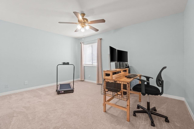 2641 Gately Dr W Unit 103, West Palm Beach, FL 33415 - office area featuring baseboards, a ceiling fan, and light carpet