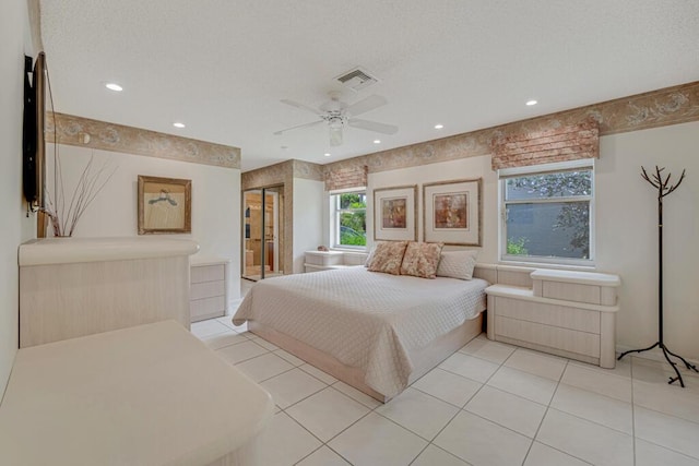 bedroom featuring ceiling fan, tile patterned flooring, a textured ceiling, recessed lighting, and visible vents