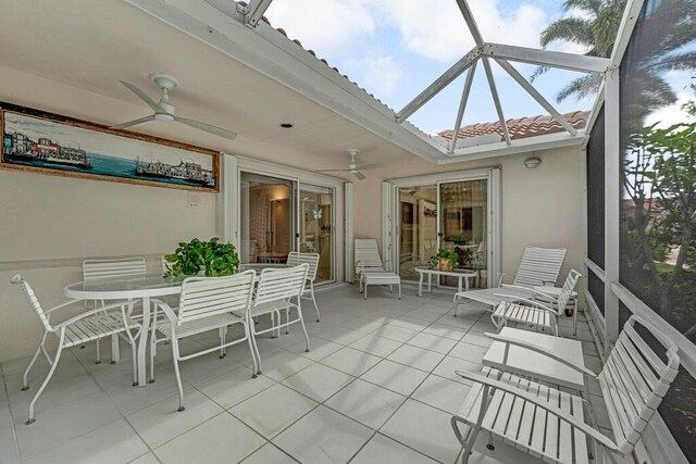 9870 Harbour Lake Cir, Boynton Beach, FL 33437 - sunroom / solarium featuring ceiling fan and outdoor dining space