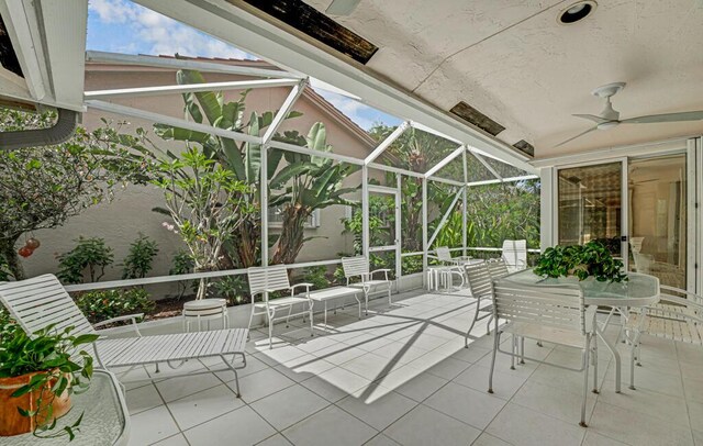 9870 Harbour Lake Cir, Boynton Beach, FL 33437 - view of patio featuring a ceiling fan and glass enclosure
