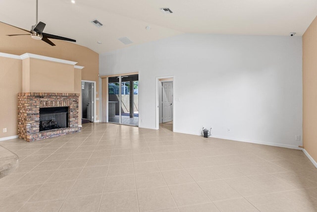 unfurnished living room with visible vents, ceiling fan, light tile patterned floors, and a fireplace