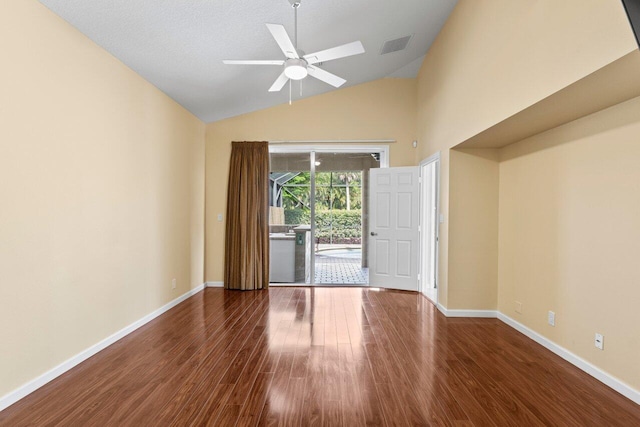 unfurnished room featuring ceiling fan, high vaulted ceiling, baseboards, wood finished floors, and visible vents