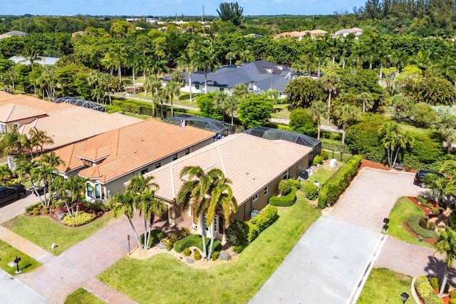 birds eye view of property with a residential view