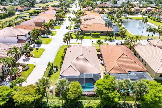 birds eye view of property featuring a residential view and a water view