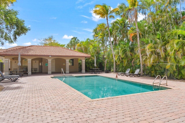 pool featuring a patio