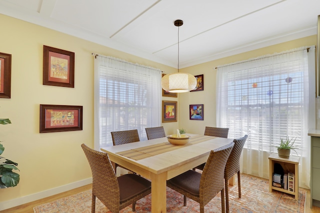 671 SW S River Dr Unit 207, Stuart, FL 34997 - dining area with baseboards and light wood-type flooring