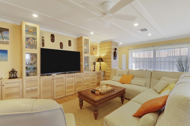 671 SW S River Dr Unit 207, Stuart, FL 34997 - living area featuring light wood-type flooring, a ceiling fan, recessed lighting, and beamed ceiling