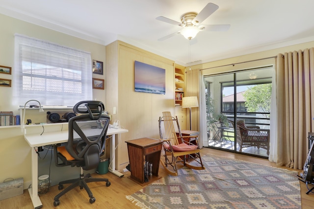 office space featuring ceiling fan and wood finished floors