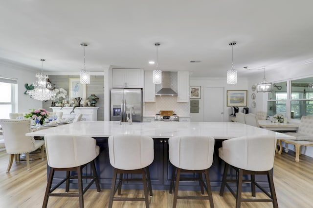 18315 SE Courtview Cir, Tequesta, FL 33469 - living area featuring crown molding, recessed lighting, visible vents, and wood finished floors