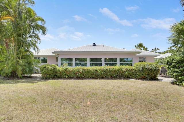 18315 SE Courtview Cir, Tequesta, FL 33469 - laundry room featuring stacked washing maching and dryer and laundry area