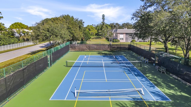 18315 SE Courtview Cir, Tequesta, FL 33469 - view of tennis court featuring fence