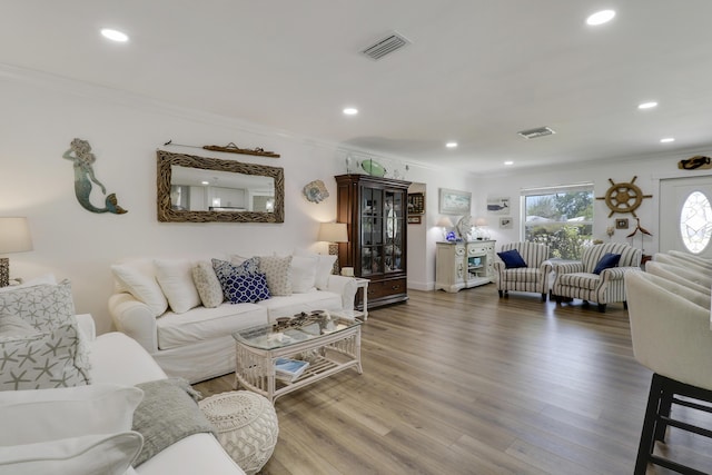 18315 SE Courtview Cir, Tequesta, FL 33469 - living area featuring crown molding, recessed lighting, visible vents, and wood finished floors