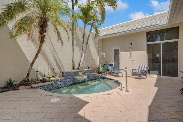 view of pool featuring a patio area