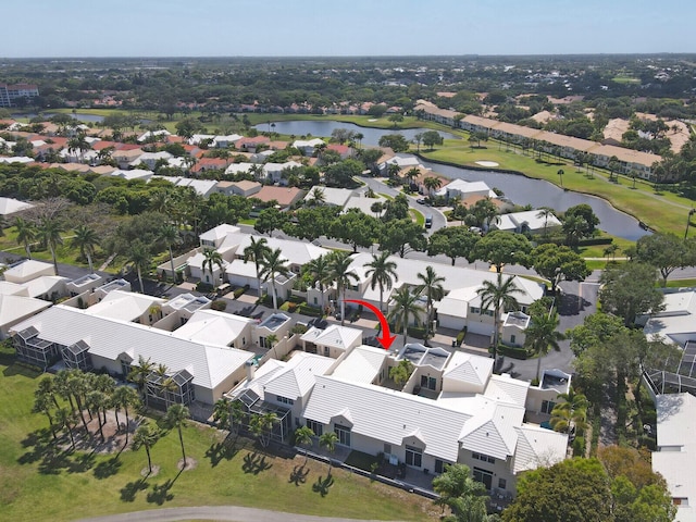 birds eye view of property featuring a residential view and a water view