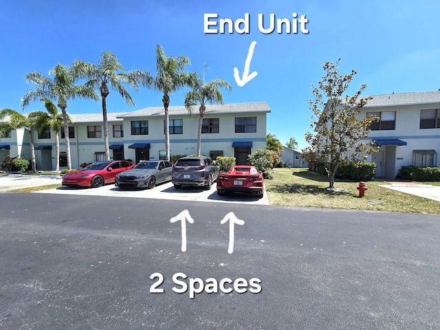 exterior space with uncovered parking