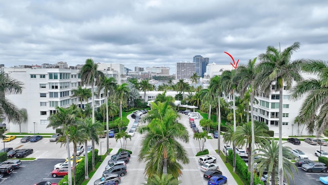 44 Cocoanut Row Unit 507A, Palm Beach, FL 33480 - view of building exterior with uncovered parking and a city view