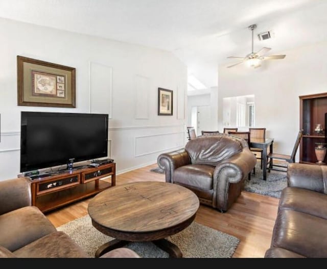 13135 Chadwick Ct Unit 7, Wellington, FL 33414 - living room featuring ceiling fan, lofted ceiling, and light wood finished floors