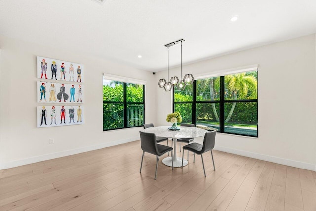 9610 Sterling Shores St, Delray Beach, FL 33446 - dining room featuring baseboards, light wood-style floors, recessed lighting, and a chandelier