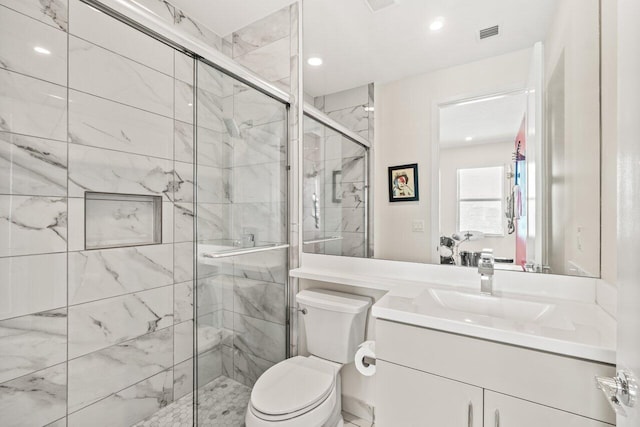 9610 Sterling Shores St, Delray Beach, FL 33446 - bathroom with toilet, vanity, a marble finish shower, and recessed lighting