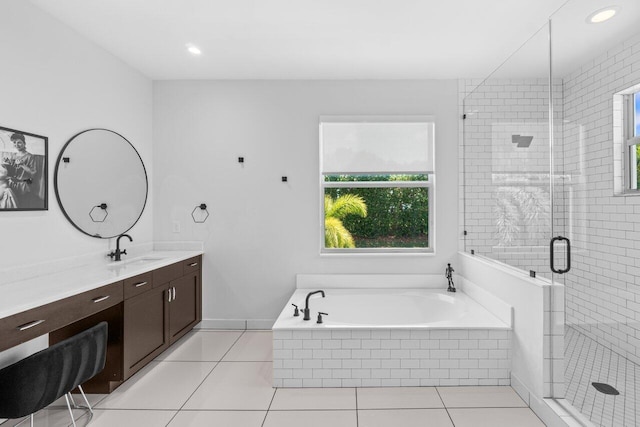 9610 Sterling Shores St, Delray Beach, FL 33446 - full bath featuring vanity, a garden tub, a shower stall, tile patterned floors, and recessed lighting