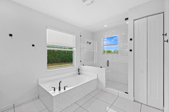 9610 Sterling Shores St, Delray Beach, FL 33446 - bathroom with a bath, a shower stall, elevator, and tile patterned flooring