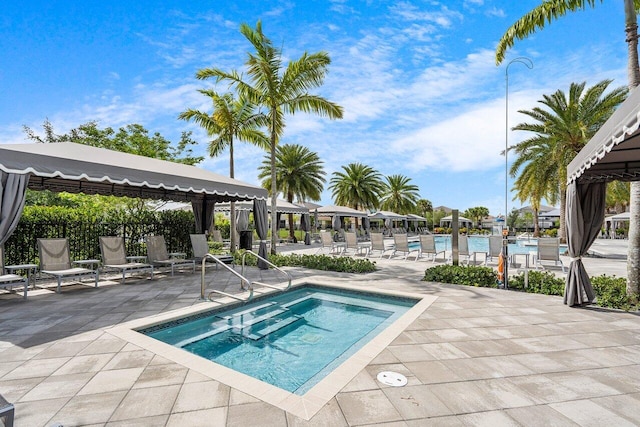 9610 Sterling Shores St, Delray Beach, FL 33446 - view of swimming pool featuring a gazebo, a patio, a hot tub, and a pool