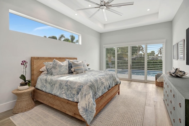 bedroom featuring recessed lighting, access to outside, light wood finished floors, and ceiling fan