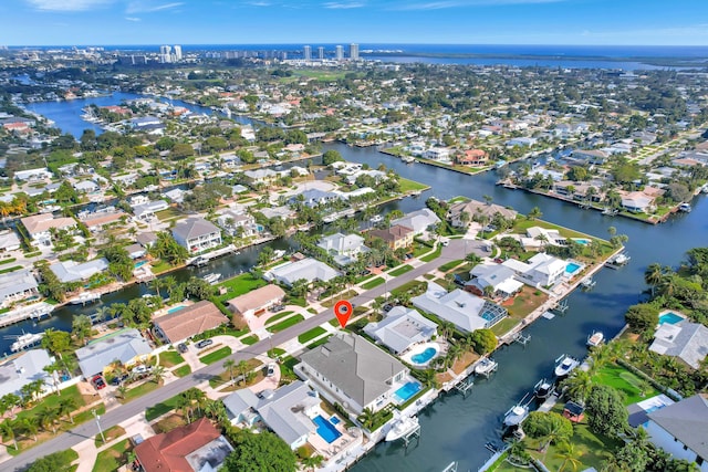 aerial view featuring a water view and a residential view