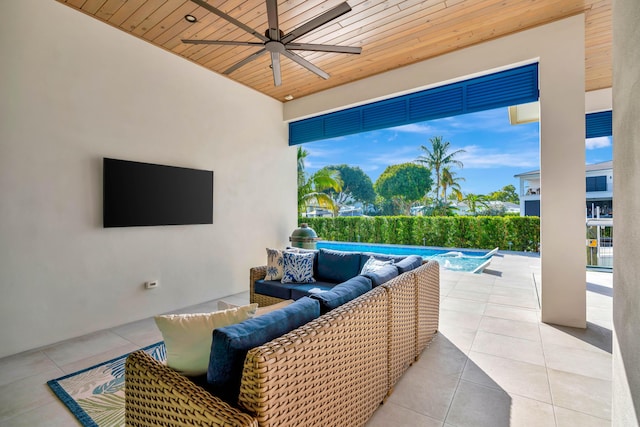 view of patio with an outdoor hangout area, a pool, and ceiling fan