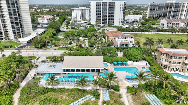 birds eye view of property featuring a city view