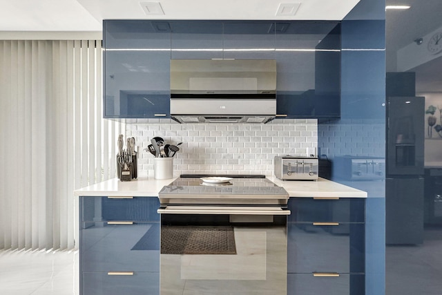 4600 S Ocean Blvd Unit 1003, Highland Beach, FL 33487 - kitchen with modern cabinets, appliances with stainless steel finishes, and decorative backsplash
