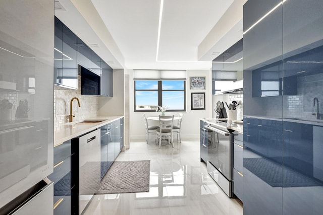 4600 S Ocean Blvd Unit 1003, Highland Beach, FL 33487 - kitchen with modern cabinets, stainless steel appliances, tasteful backsplash, and a sink