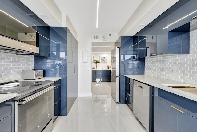4600 S Ocean Blvd Unit 1003, Highland Beach, FL 33487 - kitchen with appliances with stainless steel finishes, backsplash, and modern cabinets