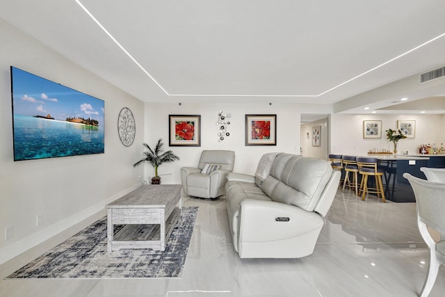4600 S Ocean Blvd Unit 1003, Highland Beach, FL 33487 - living area featuring recessed lighting, bar, and baseboards